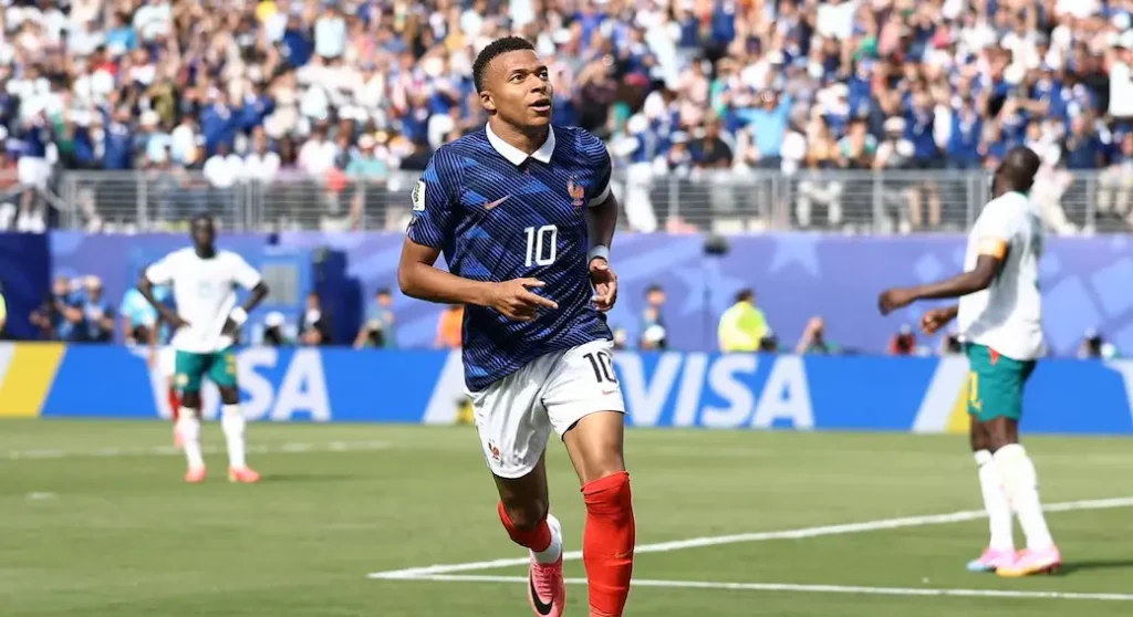 Panorama da Copa 2026: Mbappé quebra recordes, Brasil vive luto, Portugal renova com Jorge Jesus e o Mundial bate recordes ofensivos.
